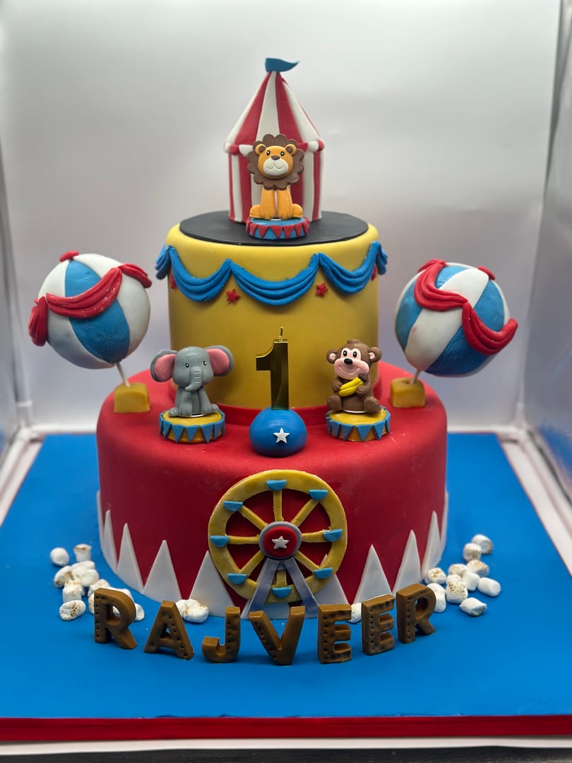 Circus-themed first birthday cake