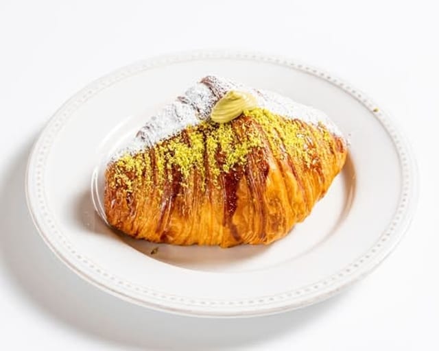 Pistachio Rolly Croissant.